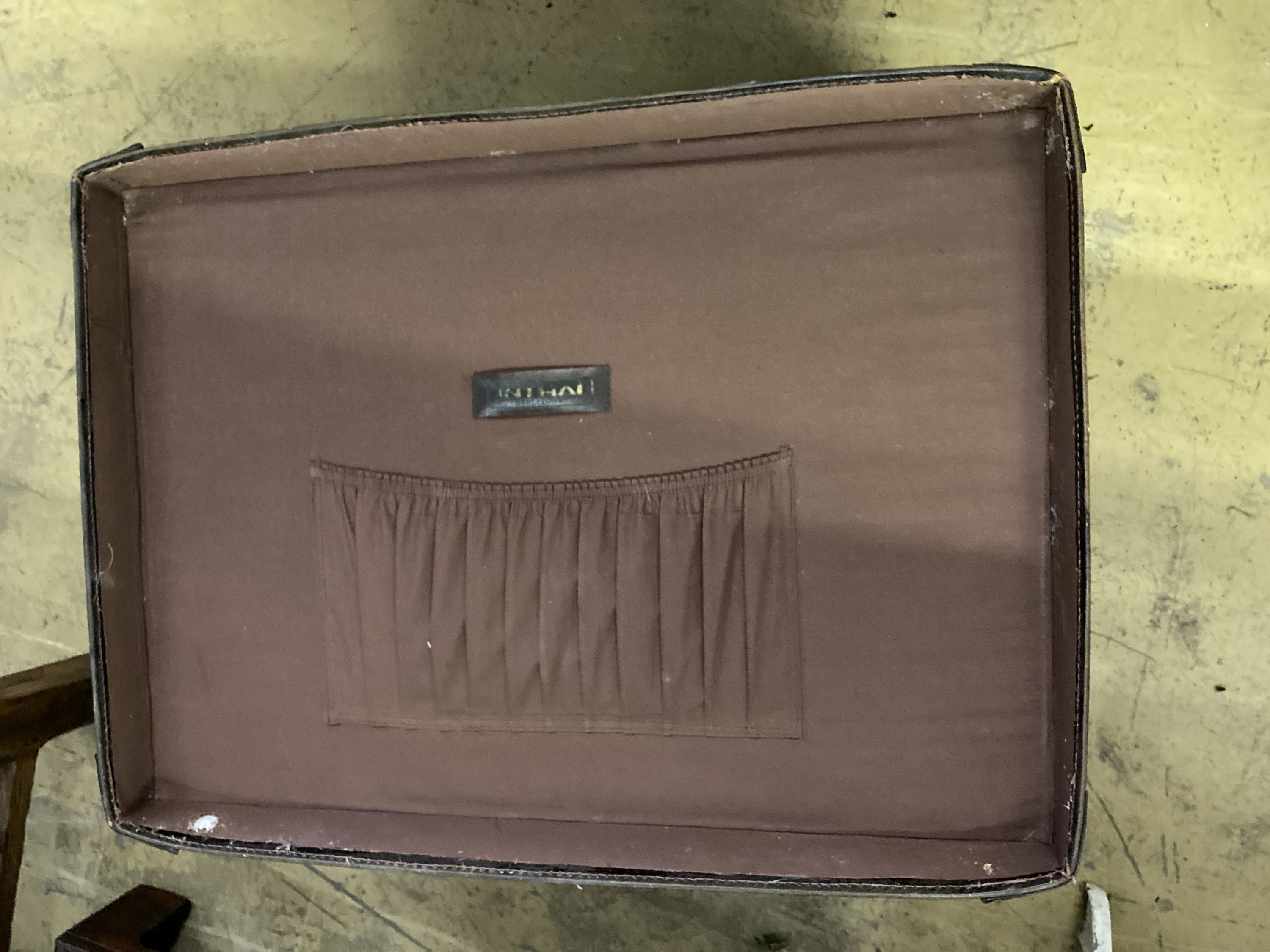 A rectangular brown leather trunk, length 70cm, depth 50cm, height 40cm